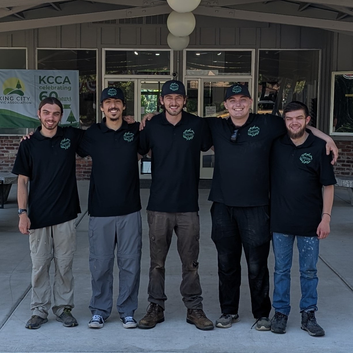 Luxury Lawns team members working on a beautiful lawn
